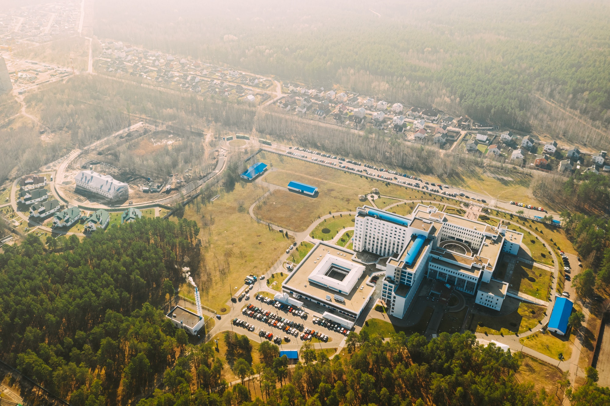 Aerial View OF Building Of Hospital In Spring Sunny Day. Top View. Drone View. Bird's Eye View